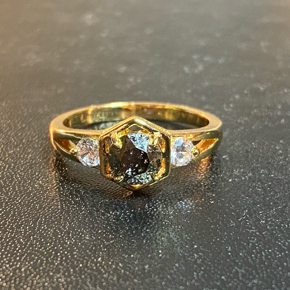Gold band with black stone size 9